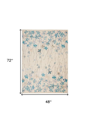 Homeroots 4' X 6' Ivory And Blue Floral Area Rug - Durable, Stain Resistant, Perfect For Homes With Kids & Pets!  Polypropylene 553271