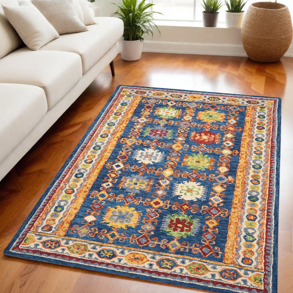 Homeroots 5' Hand-tufted Navy Blue, Orange & Green Wool Floral Area Rug - Unique Bohemian Focal Point Decor  Wool 553300