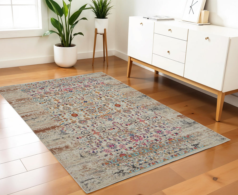 Homeroots 4' X 6' Ivory And Brown Floral Distressed Area Rug – Stain Resistant, Durable, Perfect For Any Space  Polypropylene 553362