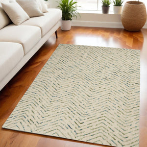 Homeroots 8' Modern Ivory Blue And Green Wool Chevron Area Rug - Perfect For Enhancing Your Home's Style 5' X 7' Wool 553390