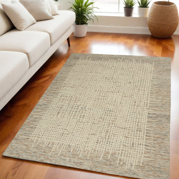 Homeroots 8' Beige And Tan Wool Abstract Area Rug - Perfect For Adding Warmth And Style To Any Room! 5' X 7' Wool 553399