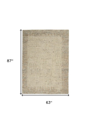 Homeroots 8' Beige And Tan Wool Abstract Area Rug - Perfect For Adding Warmth And Style To Any Room! 5' X 7' Wool 553399
