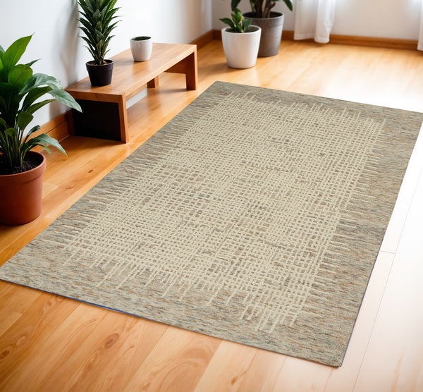 Homeroots 8' Beige And Tan Wool Abstract Area Rug - Perfect For Adding Warmth And Style To Any Room! 4' X 6' Wool 553401
