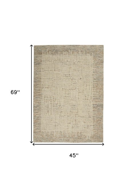 Homeroots 8' Beige And Tan Wool Abstract Area Rug - Perfect For Adding Warmth And Style To Any Room! 4' X 6' Wool 553401