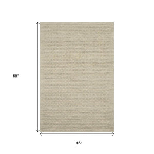 I Need to Find the First Word Common to the Variant Titles. Looking at the Variants, They Start with "8", "7", "5", "4" - These Are Size Values I Must Avoid. Let Me Look at the Key: "taupe-wool-area-rug" - but I to the Original From The