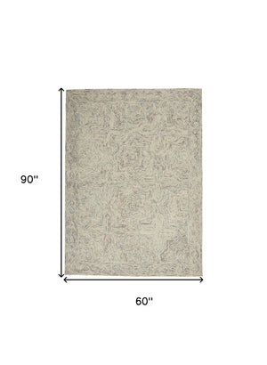 Homeroots 5' X 8' Ivory And Blue Wool Geometric Area Rug  Wool 553511