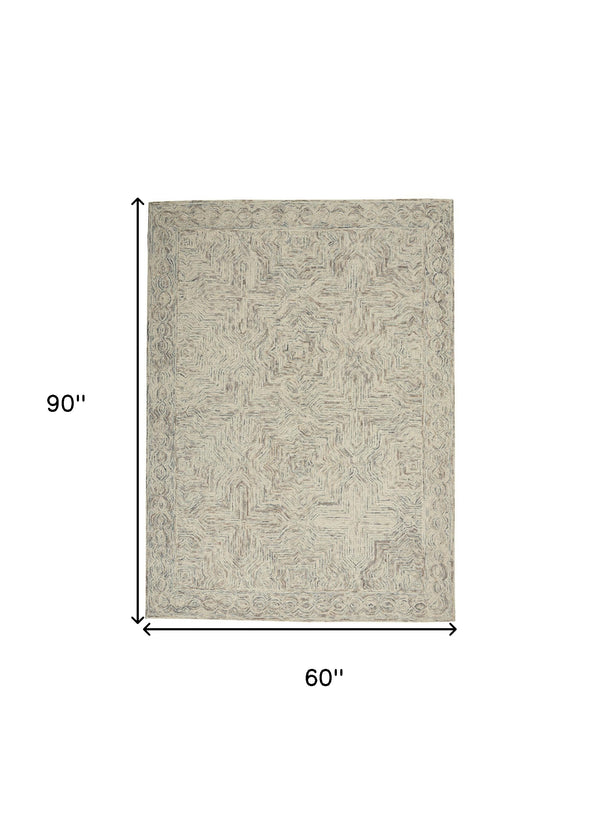 Homeroots 5' X 8' Ivory And Blue Wool Geometric Area Rug  Wool 553511