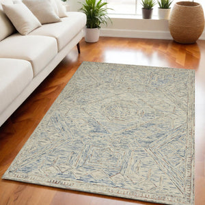 Homeroots 5' X 8' Tan And Blue Wool Geometric Area Rug  Wool 553512