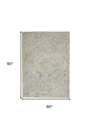 Homeroots 5' X 8' Tan And Blue Wool Geometric Area Rug  Wool 553512