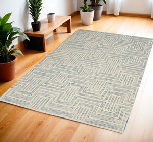 Homeroots 4' X 6' Ivory And Turquoise Wool Geometric Area Rug  Wool 553525