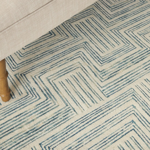 HomeRoots 5' Ivory and Turquoise Wool Geometric Area Rug - Modern Design for Cozy Living Spaces and Style 4' X 6' 553525