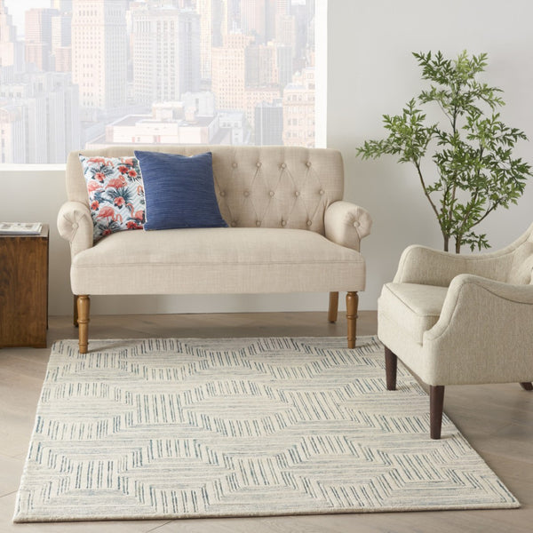 HomeRoots 5' Ivory and Turquoise Wool Geometric Area Rug - Modern Design for Cozy Living Spaces and Style 4' X 6' 553525