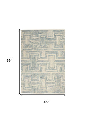 Homeroots 4' X 6' Ivory And Turquoise Wool Geometric Area Rug  Wool 553525
