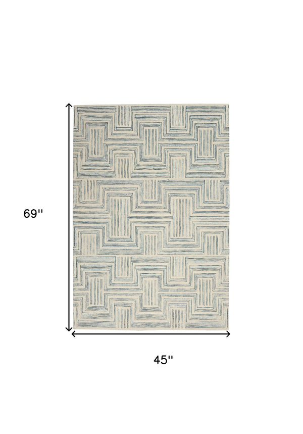 Homeroots 4' X 6' Ivory And Turquoise Wool Geometric Area Rug  Wool 553525