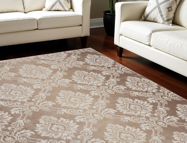 Homeroots 9' X 12' Ivory And Brown Damask Distressed Non Skid Area Rug  Polypropylene 553533
