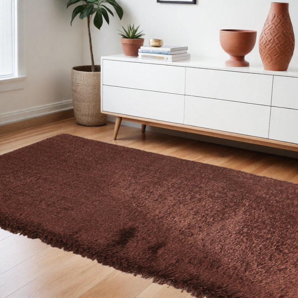 Homeroots 8' X 11' Brown Shag Hand Tufted Area Rug  Polyester 553573