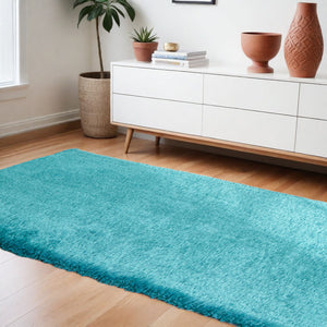 Homeroots 8' X 11' Turquoise Shag Hand Tufted Area Rug  Polyester 553588