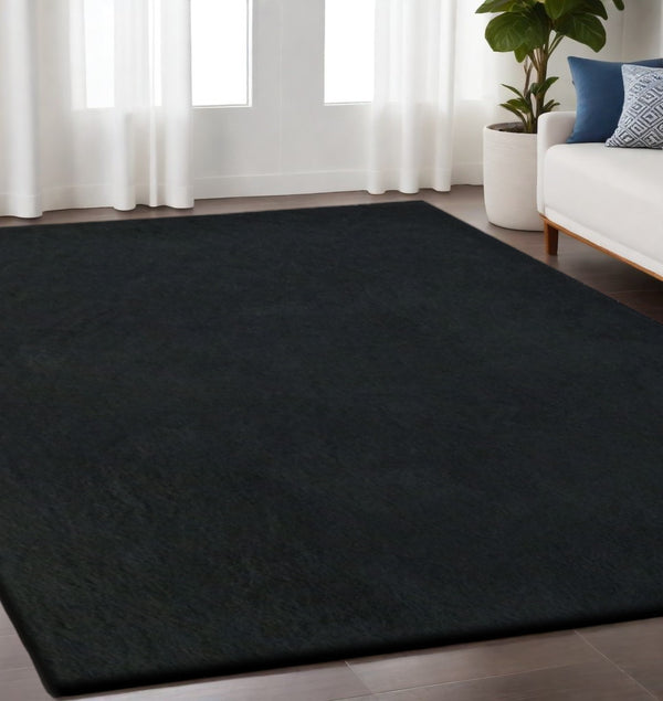Homeroots 5' X 7' Black Shag Hand Tufted Area Rug  Polyester 553600