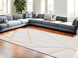 Homeroots 6' X 9' White And Gold Faux Sheepskin Abstract Geometric Machine Tufted Washable Non Skid Area Rug  Faux Fur 553635