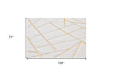 Homeroots 6' X 9' White And Gold Faux Sheepskin Abstract Geometric Machine Tufted Washable Non Skid Area Rug  Faux Fur 553635