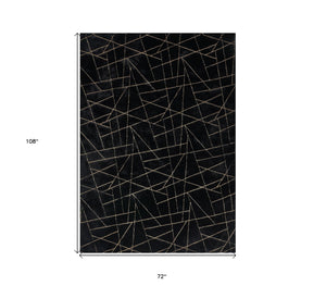 Homeroots 6' X 9' Black And Gold Faux Fur Abstract Shag Non Skid Area Rug  Faux Fur 553637