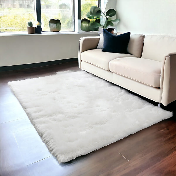 Homeroots 4' X 6' White Faux Sheepskin Shag Washable Area Rug  Faux Sheepskin 553639
