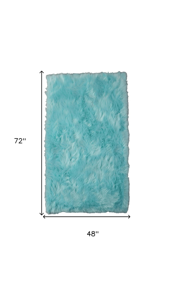 Homeroots 4' X 6' Turquoise Faux Sheepskin Shag Washable Area Rug  Faux Sheepskin 553641