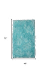 Homeroots 4' X 6' Turquoise Faux Sheepskin Shag Washable Area Rug  Faux Sheepskin 553641