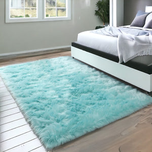 Homeroots 5' X 7' Turquoise Faux Sheepskin Shag Washable Area Rug  Faux Sheepskin 553642