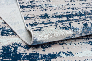 Homeroots 10' Blue And Ivory Abstract Washable Non Skid Area Rug  Polyester 553762