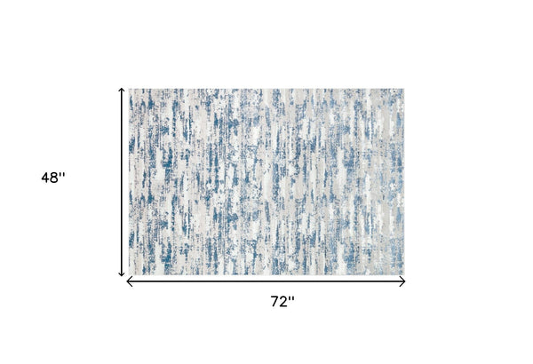 Homeroots 4' X 6' Blue And Ivory Abstract Washable Non Skid Area Rug  Polyester 553763