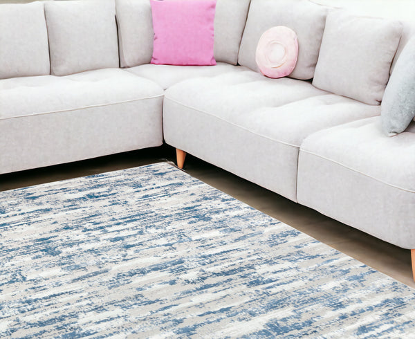 Homeroots 10' X 13' Blue And Ivory Abstract Washable Non Skid Area Rug  Polyester 553764