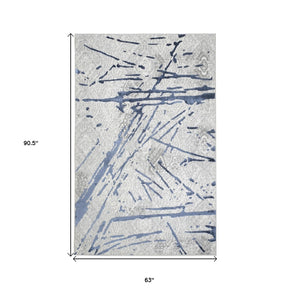 Homeroots 5' X 8' Ivory And Blue Abstract Area Rug  Polyester 553855