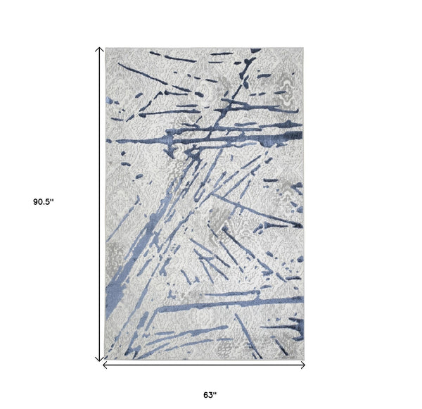 Homeroots 5' X 8' Ivory And Blue Abstract Area Rug  Polyester 553855