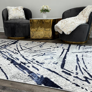 Homeroots 9' X 12' Ivory And Blue Abstract Area Rug  Polyester 553857