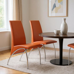 HomeRoots Set of Two Vibrant Orange Faux Leather Dining Chairs with Sleek Silver Legs for Stylish Comfort 553879