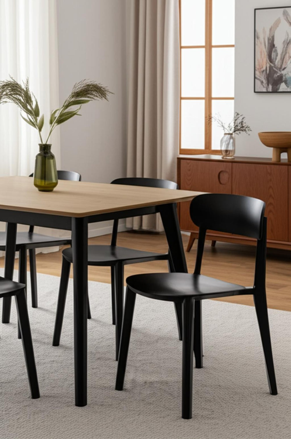 HomeRoots Set of Four Stylish Black Heavy-Duty Plastic Dining Chairs for Versatile Home and Office Use 553939