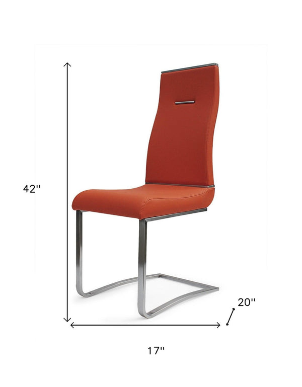 HomeRoots Set of Two Stylish Orange Faux Leather Dining Chairs with Sleek Silver Legs for Modern Spaces 553960