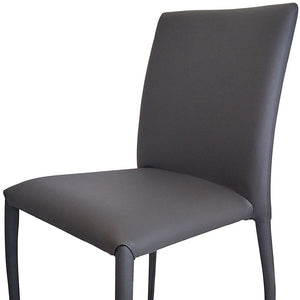 HomeRoots Set of Four Gray Upholstered Faux Leather Dining Chairs - Stylish, Stackable, and Space-Saving Comfort 553974
