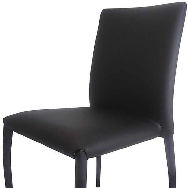 HomeRoots Set of Four Stylish Black Faux Leather Dining Chairs – Contemporary, Stackable, and Versatile Design 553975