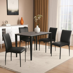 HomeRoots Set of Four Stylish Black Faux Leather Dining Chairs – Contemporary, Stackable, and Versatile Design 553975