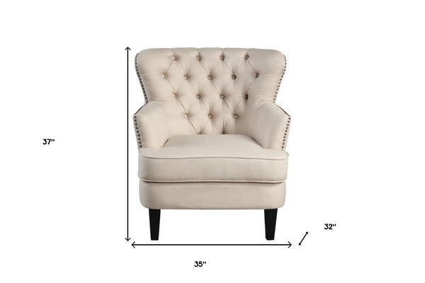 HomeRoots 35" Beige and Black Tufted Wingback Chair - Elegant Design, Removable Cushions, Stylish Nailhead Trim 554181