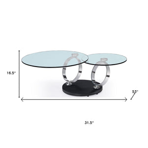 HomeRoots 32" Clear Glass Round Coffee Table with Black and Silver Abstract Metal Base for Modern Spaces 554265