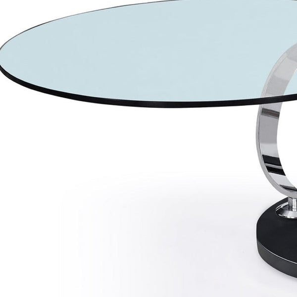 HomeRoots 32" Clear Glass Round Coffee Table with Black and Silver Abstract Metal Base for Modern Spaces 554265