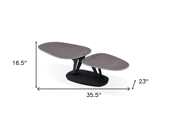 HomeRoots 36" Gray Ceramic Faux Marble Oval Coffee Table with Black Metal Base for Stylish Living Spaces 554269