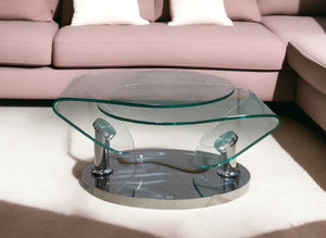 Homeroots 30" Clear Glass And Silver Metal Oval Abstract Coffee Table - Stylish Accent For Living Spaces   554294