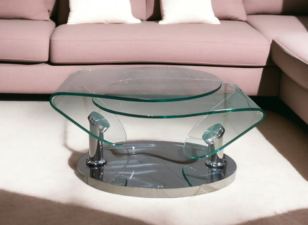 Homeroots 30" Clear Glass And Silver Metal Oval Abstract Coffee Table - Stylish Accent For Living Spaces   554294