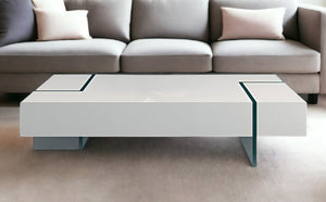 Homeroots 53" Contemporary White & Clear Wood And Glass Sled Coffee Table - Stylish Living Room Accent Piece   554301