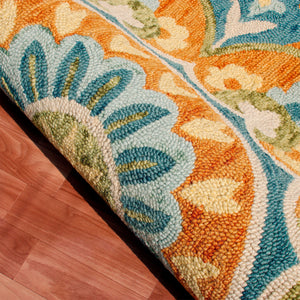 Homeroots 4' Orange And Blue Round Wool Floral Hand Tufted Area Rug Rust Wool 554452