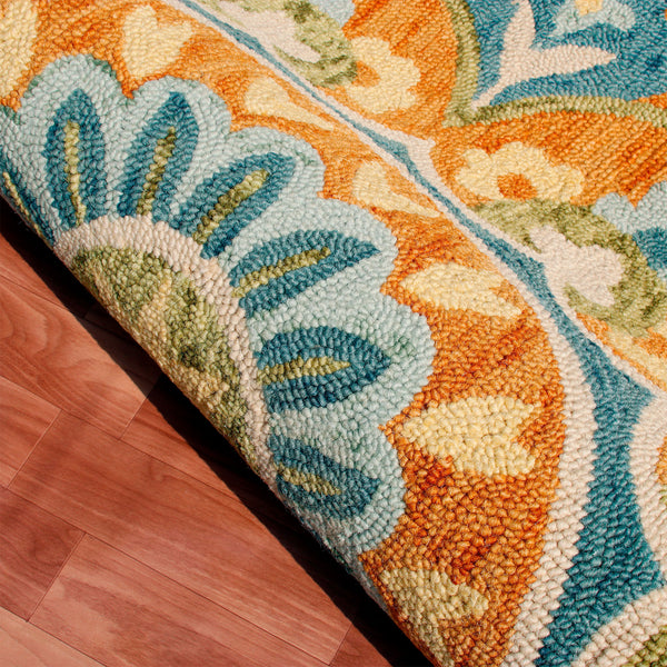 Homeroots 4' Orange And Blue Round Wool Floral Hand Tufted Area Rug Rust Wool 554452